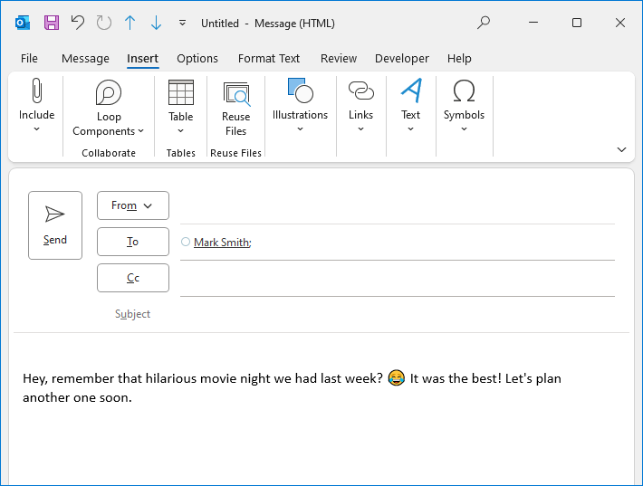 Emoji symbol is inserted in an Outlook email.