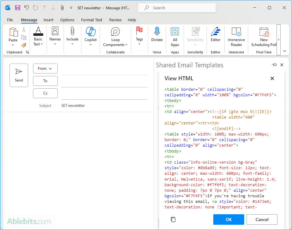 Paste HTML code into the Outlook email template.