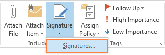 Aby utworzyć polowanie w programie Outlook, kliknij kontrolkę Podpisy na karcie Wiadomość. loading=